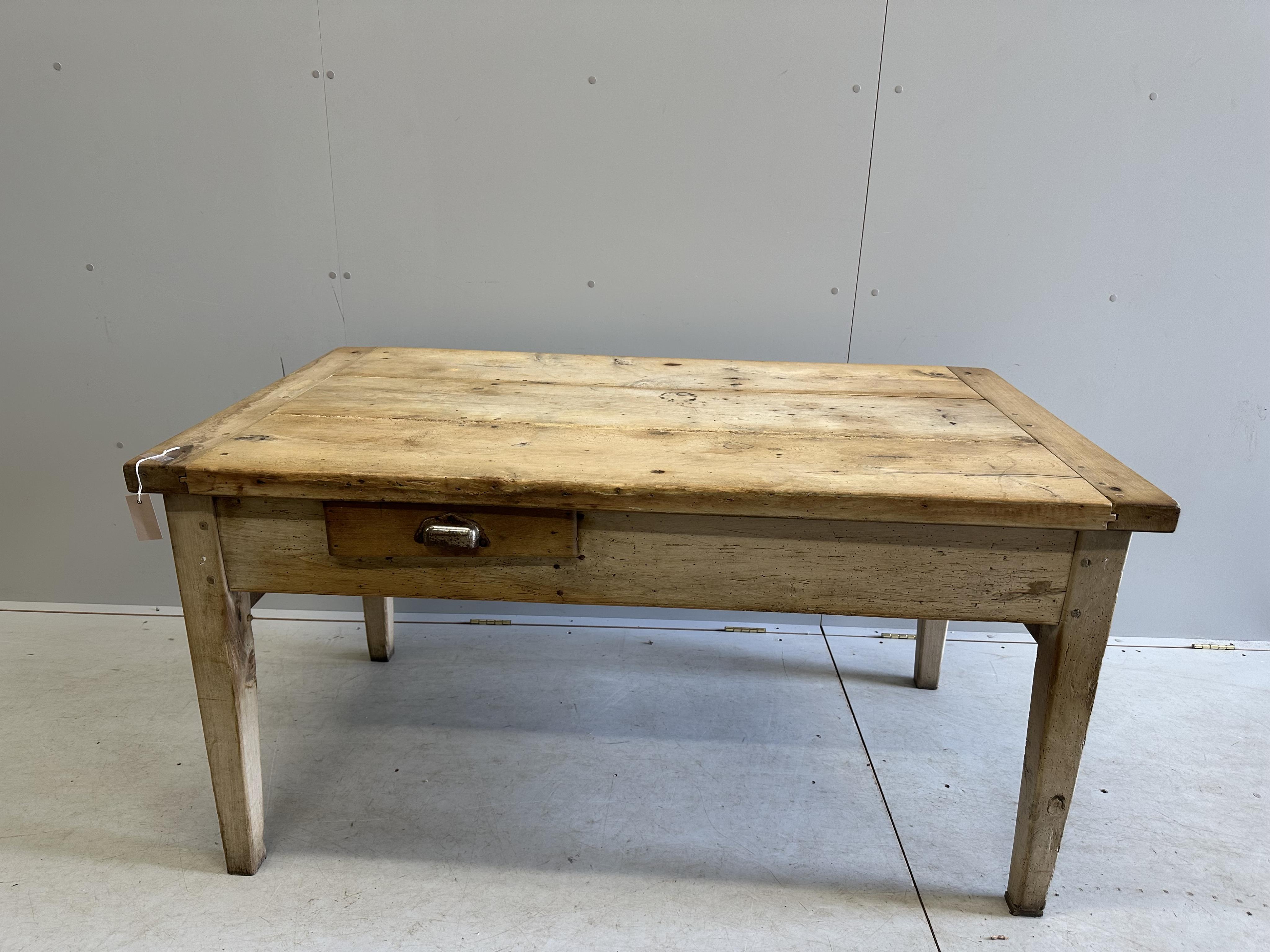 A 19th century French rectangular beech kitchen table, width 144cm, depth 82cm, height 75cm. Condition - fair, evidence of old worm now dormant